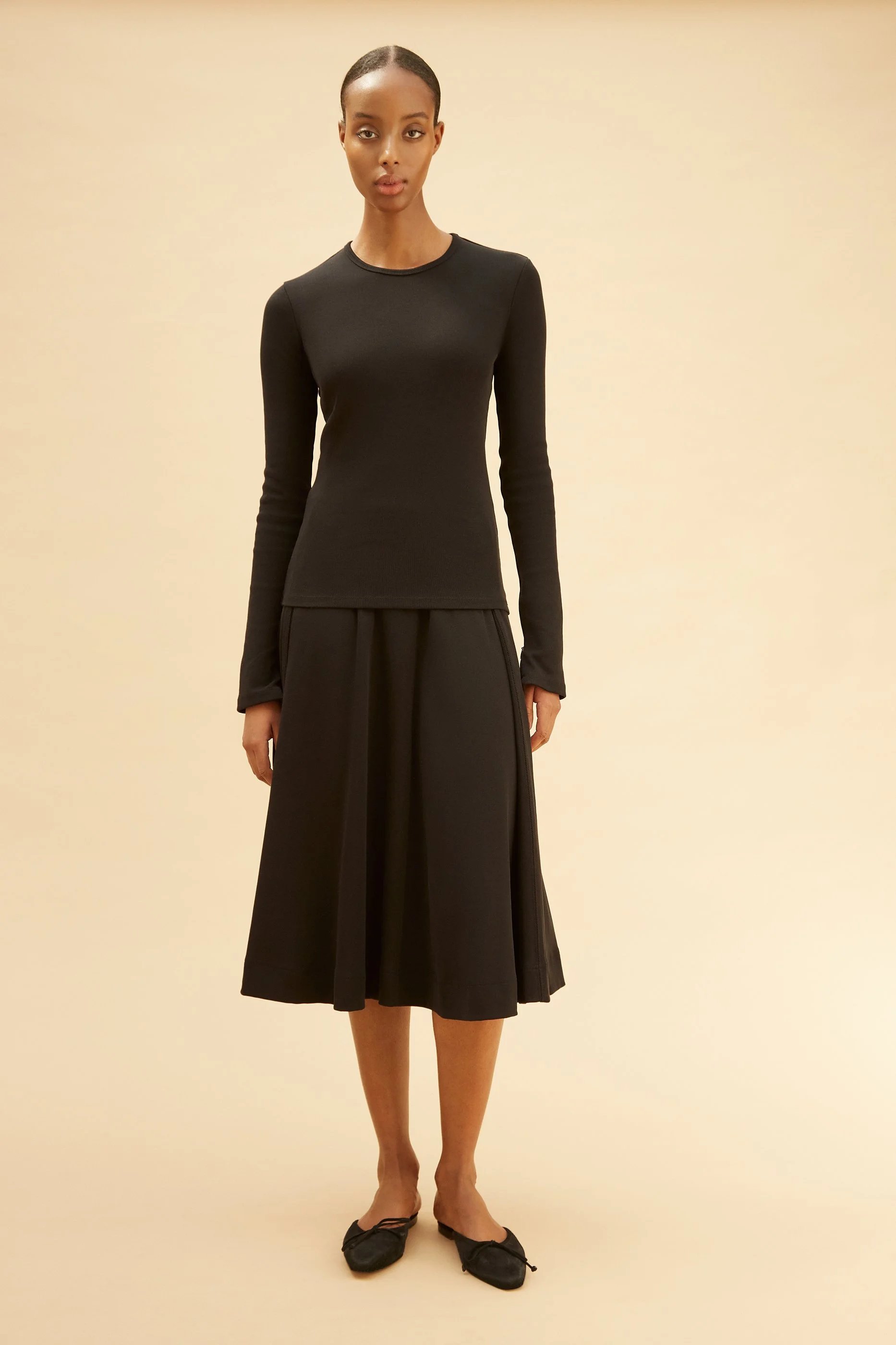 The Iman Longsleeves Jersey Top in Deep Black — REFINE